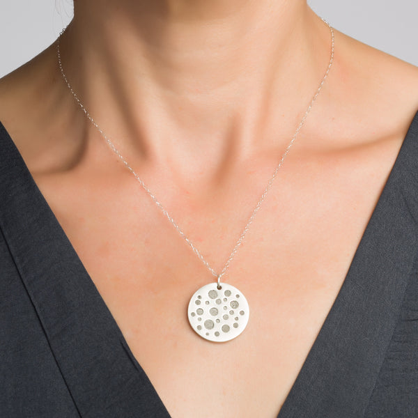 Circles Concrete Necklace, by BAARA Jewelry. Silver and Cement Handmade Double Sided Pendant.