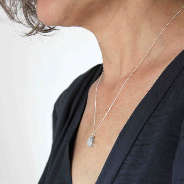 Drop shaped gem concrete necklace, by BAARA. Unique necklace for women. Gift for architect, gift for young teen, cement necklace, classic necklace with a twist