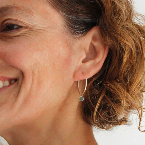 Silver hoop earrings with circle dangle charm, minimal hoop earrings, BAARA Jewelry