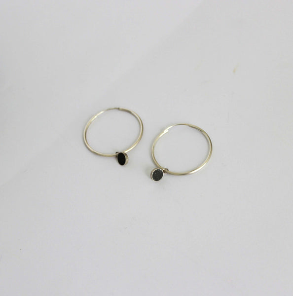 Silver hoop earrings with concrete dangle charm