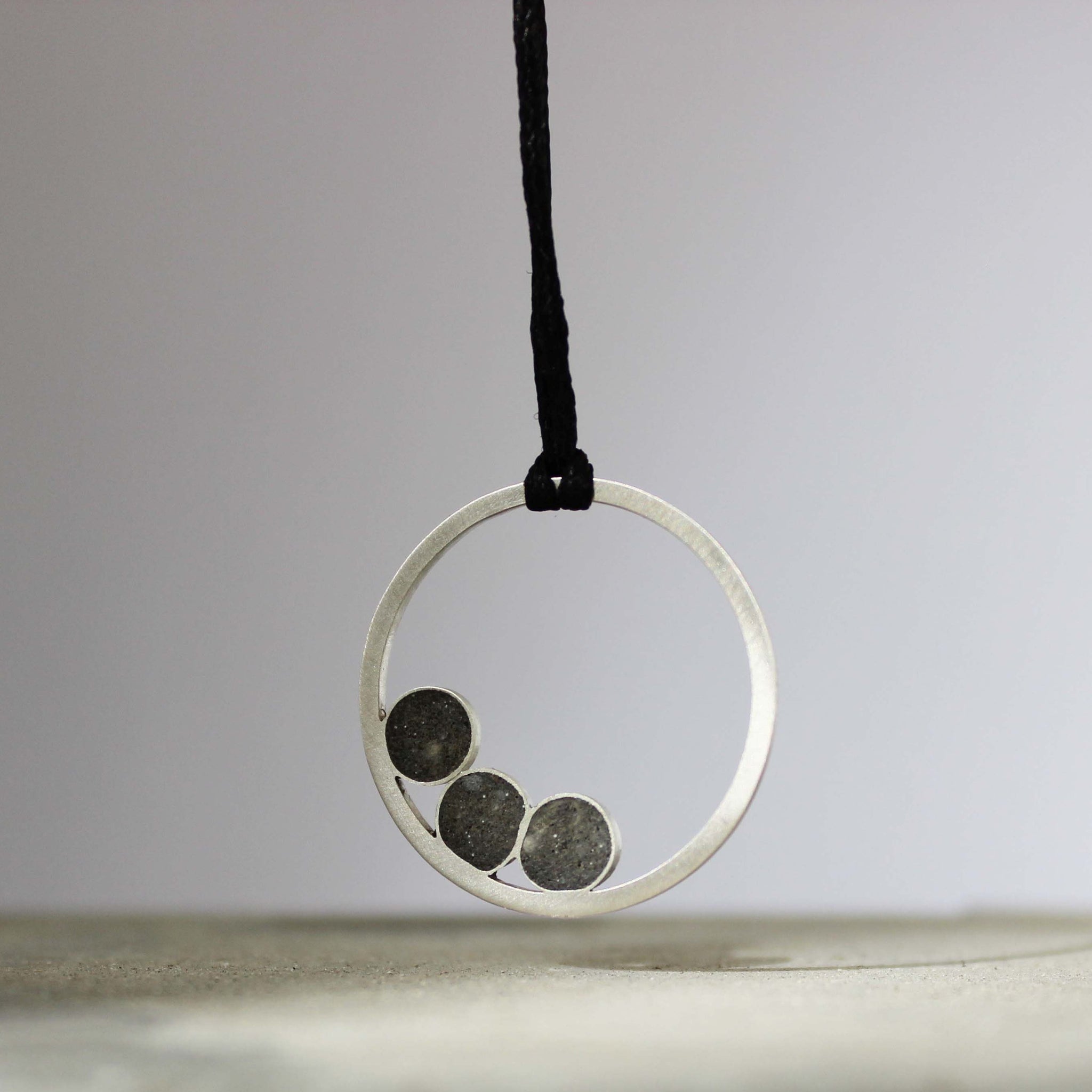 Leora Silver and Concrete Necklace, by BAARA Jewelry. Circular Pendant, Black Jewelry, Concrete Jewelry, Handmade Necklace